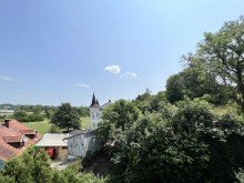 Blick vom Balkon 4-Zimmer-Eigentumswohnung mit Kachelofen und Garage.